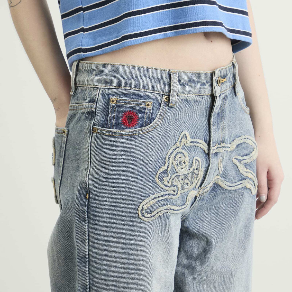 ICECREAM Women's Distressed Running Dog Denim Pants in Vintage Wash