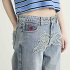 ICECREAM Women's Distressed Running Dog Denim Pants in Vintage Wash