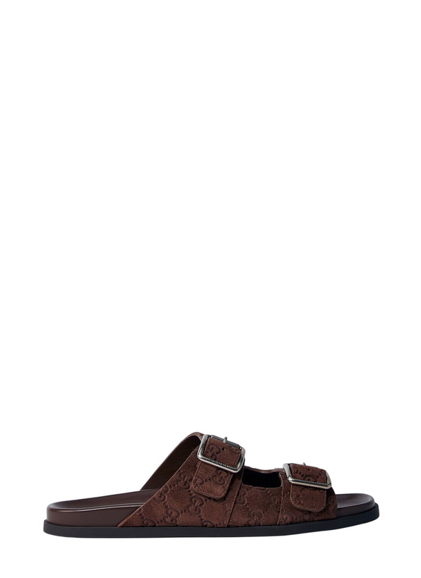 Photo: Gucci Logo Embossed Leather Slides