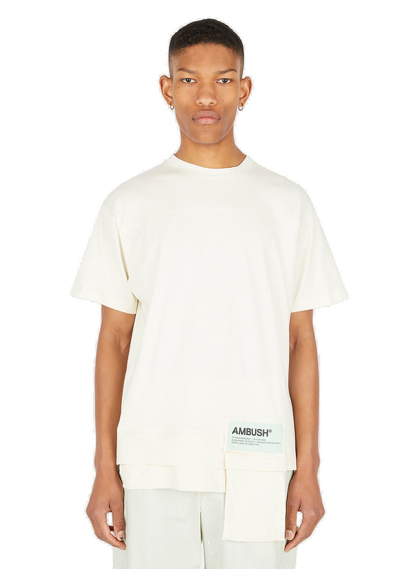 Photo: Asymmetric Logo Patch T-Shirt in White