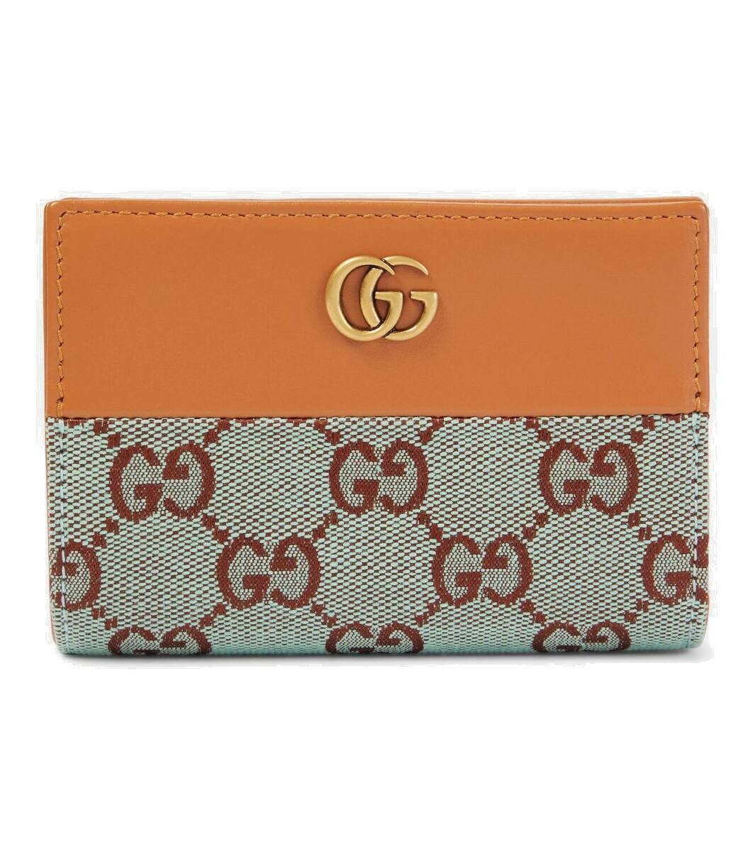 Photo: Gucci GG leather-trimmed wallet
