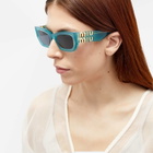 Miu Miu Eyewear Women's 09WS Sunglasses in Opal Anise