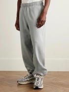 Nike - Solo Swoosh Tapered Logo-Embroidered Cotton-Blend Jersey Sweatpants - Gray