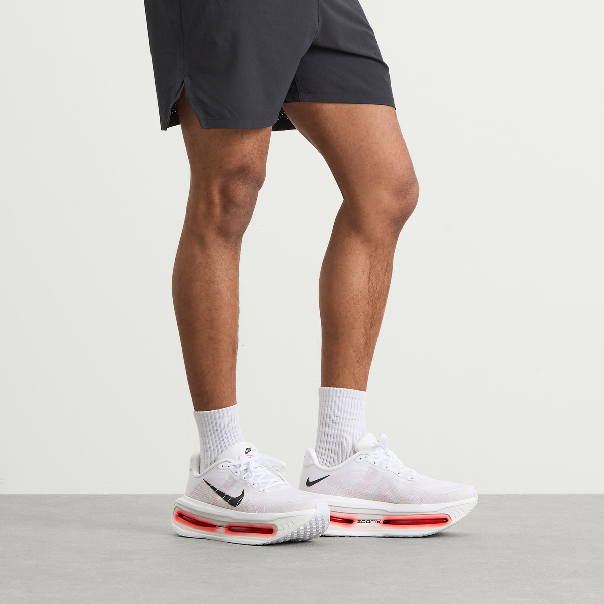 Nike Running Men's Nike Vomero Premium Sneaker in White/Black/Bright Crimson/Photon Dust