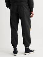 Y,IWO - Tapered Logo-Print Cotton-Jersey Sweatpants - Black