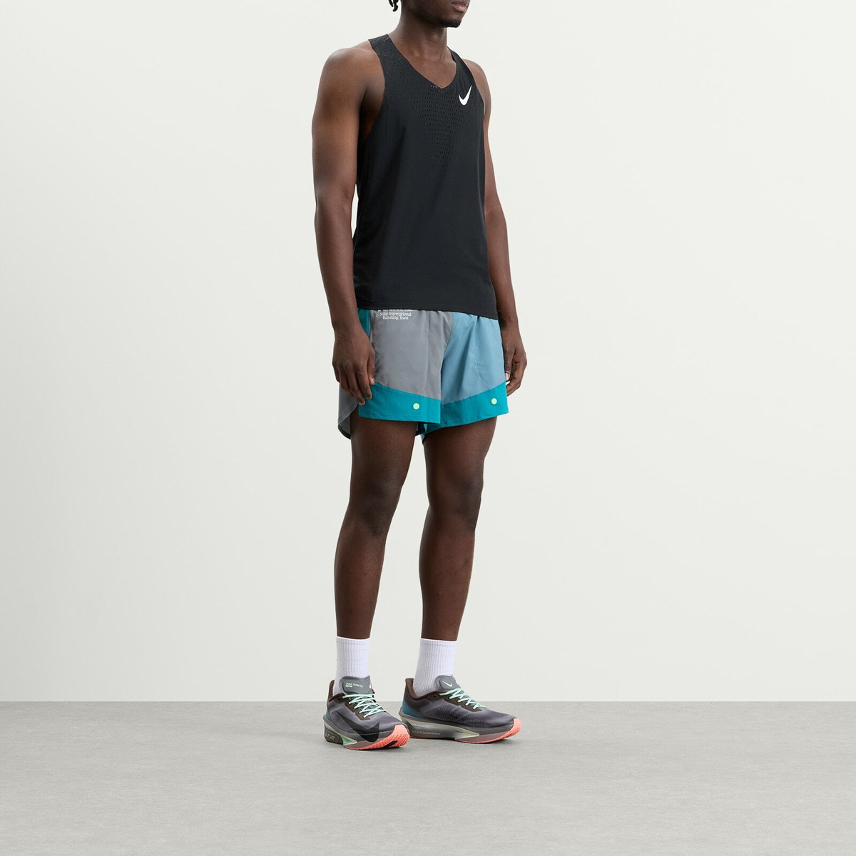 Nike Men's Stride Short in Bright Spruce