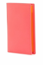 COMME DES GARCONS WALLET portafoglio compatto unisex rosa fluo in pelle di capra Pink