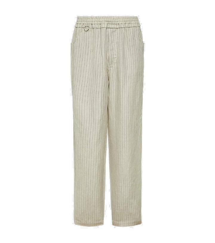 Photo: Undercover Pinstripe wool and linen wide-leg pants