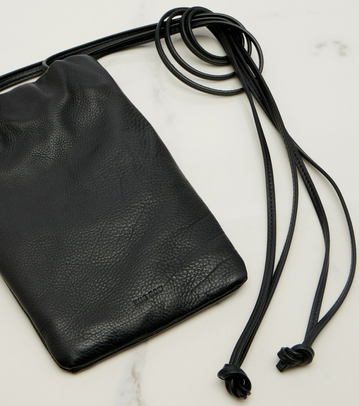 The Row Bourse leather phone pouch