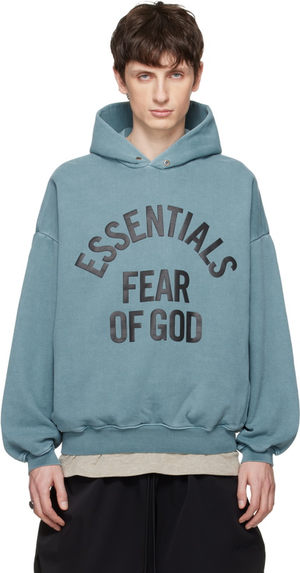 Photo: Fear of God ESSENTIALS Blue Campus 90s Hoodie