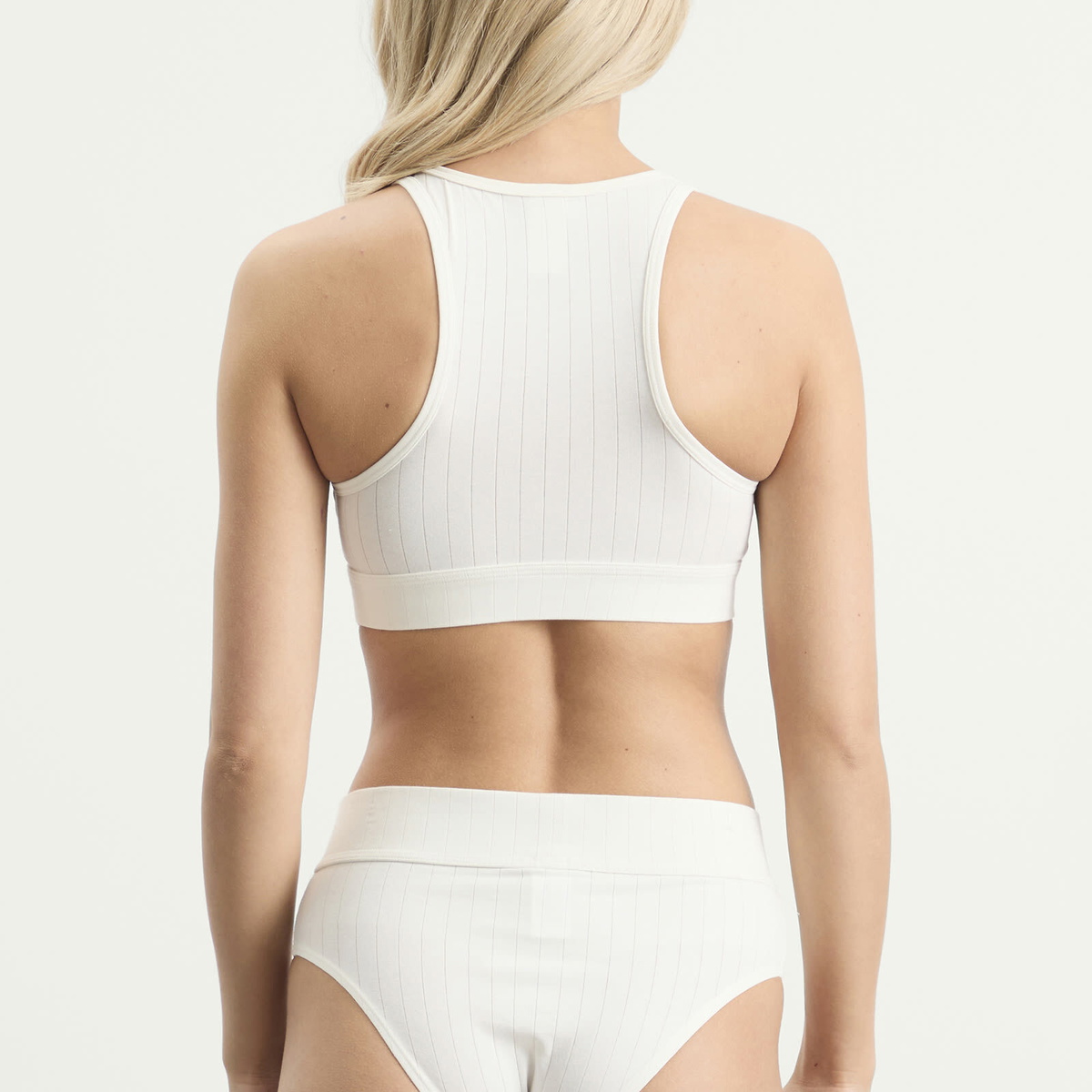 Calvin Klein Women's Heritage Athletic Unlined Bralette in Tofu