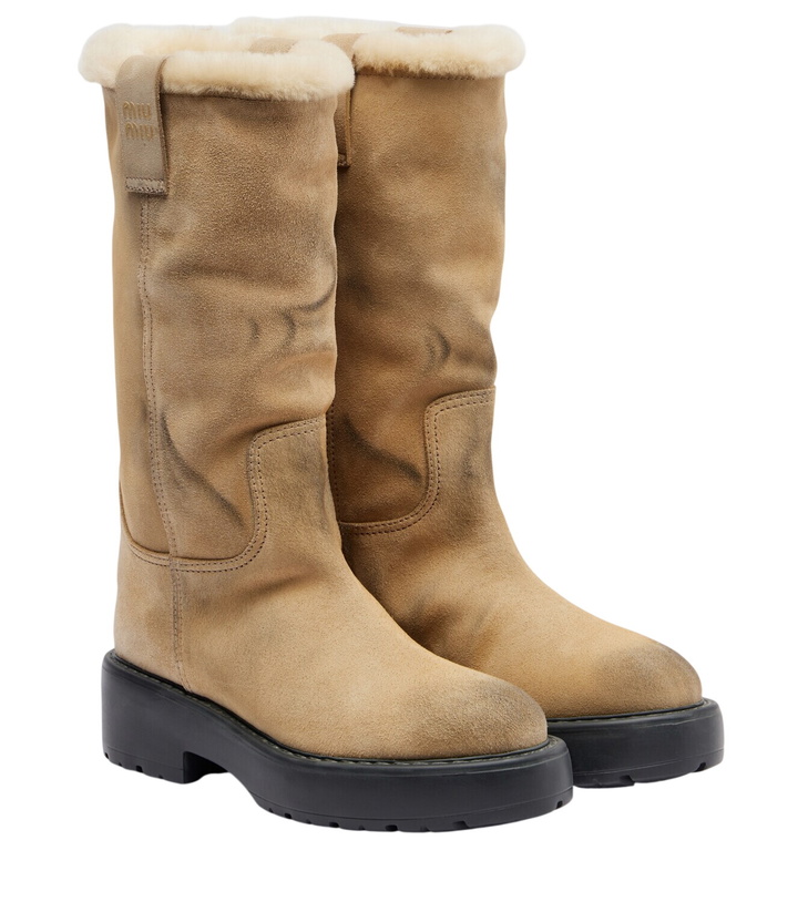 Photo: Miu Miu Shearling-lined suede knee-high boots