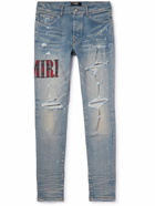 AMIRI - Skinny-Fit Appliquéd Distressed Jeans - Blue