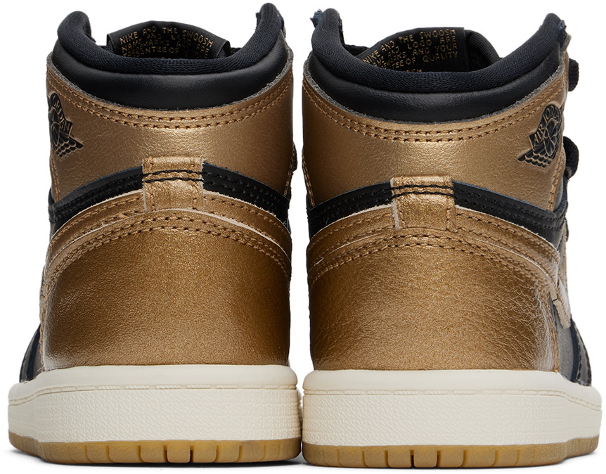 youth black and gold jordans