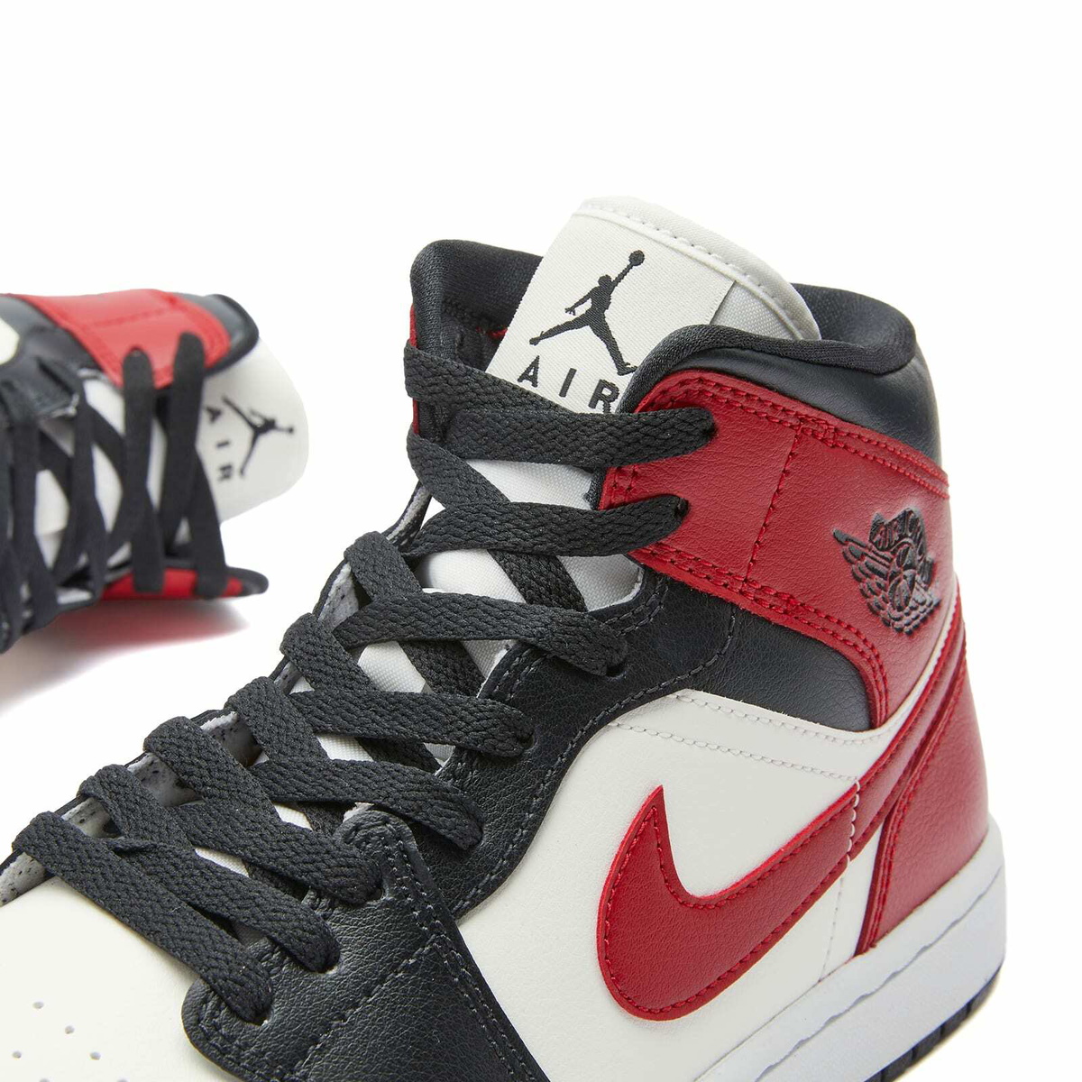 Air Jordan Women's 1 MID W Sneakers in Sail/Red/White
