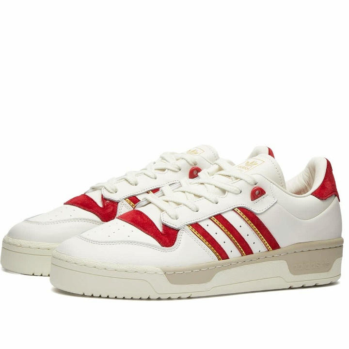 Photo: Adidas Men's RIVALRY 86 LOW Sneakers in Cloud White/Team Power Red/Ivory