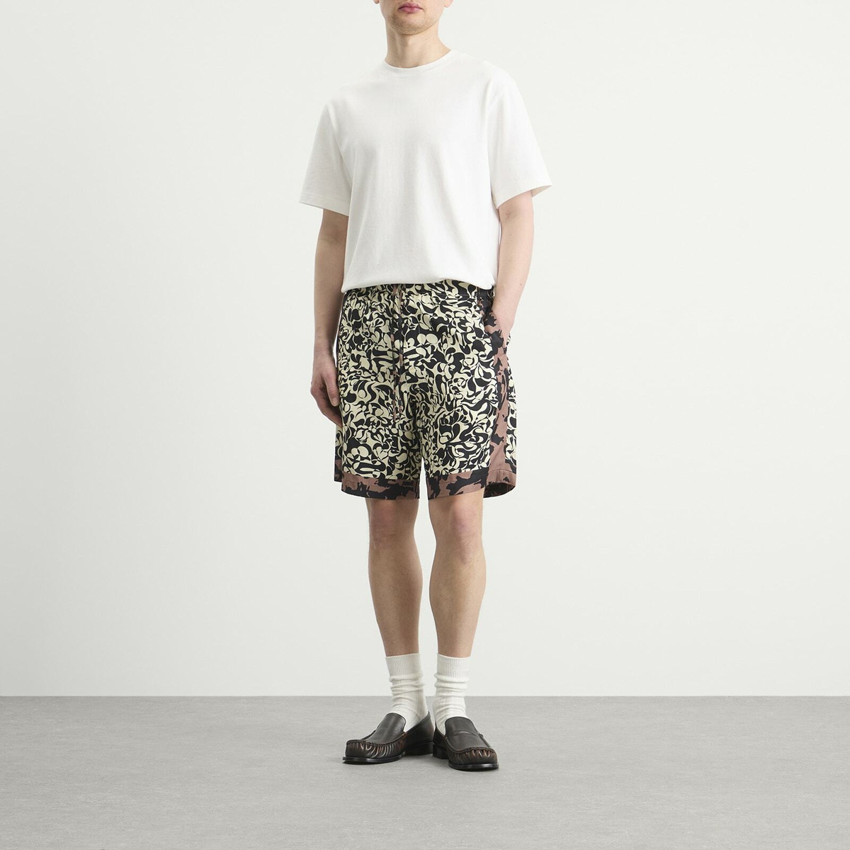 Dries Van Noten Men's Squiggle Border Print Shorts in Black