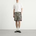 Dries Van Noten Men's Squiggle Border Print Shorts in Black