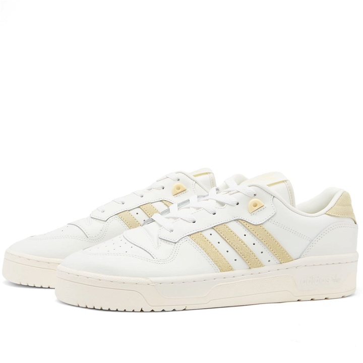 Photo: Adidas Men's Rivalry Low Sneakers in White Tint/Easy Yellow