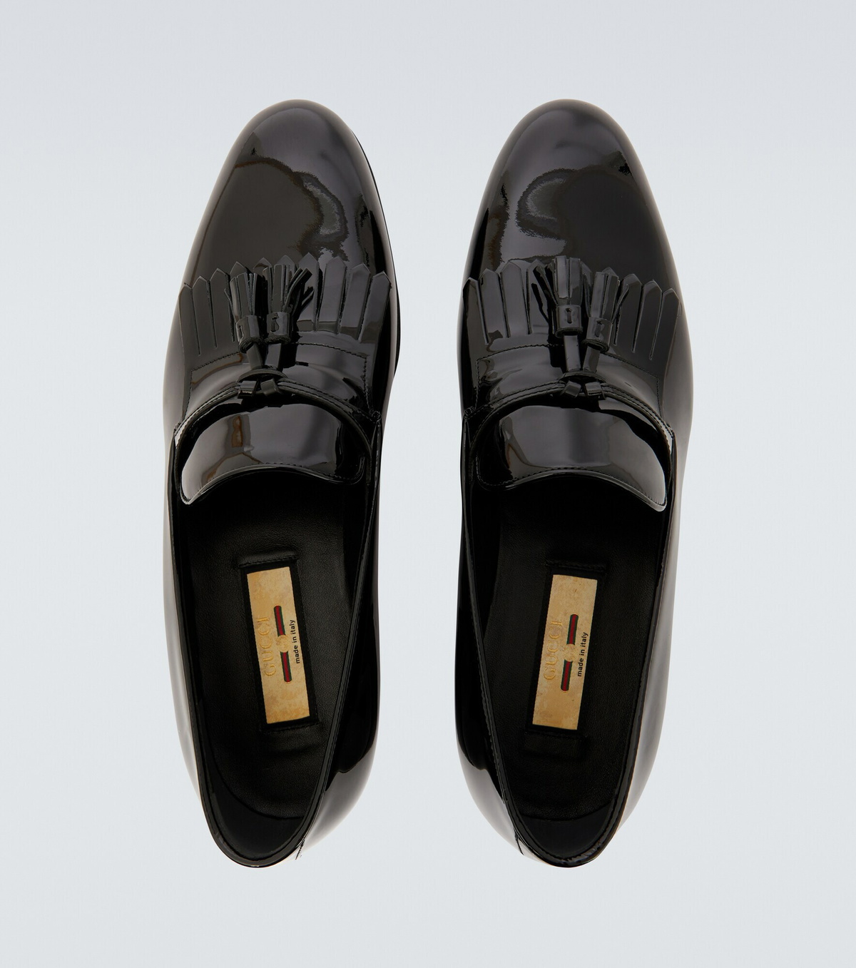 Gucci - Tasseled patent leather loafers