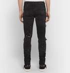 AMIRI - Skinny-Fit Appliquéd Paint-Splattered Distressed Stretch-Denim Jeans - Black