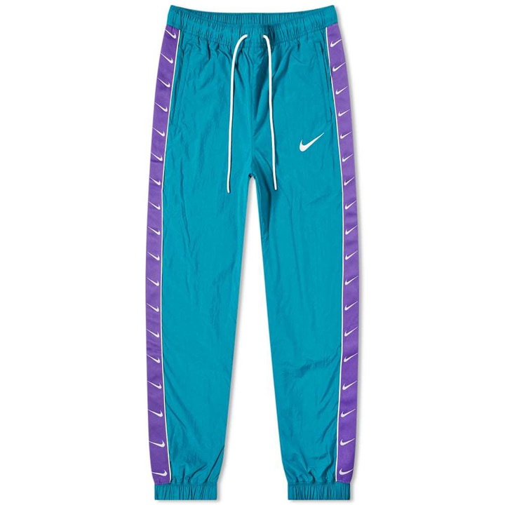 Photo: Nike Taped Swoosh Woven Pant