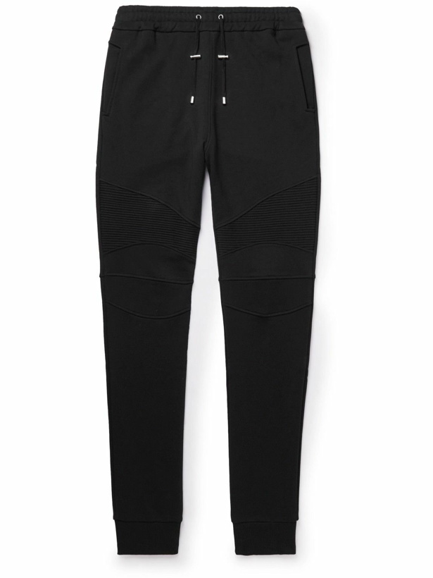 Photo: Balmain - Slim-Fit Tapered Panelled Logo-Flocked Cotton-Jersey Sweatpants - Black