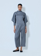 Pleats Please Issey Miyake Pleated Wide-Leg Trousers