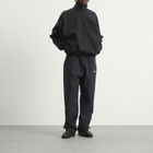 Fear of God ESSENTIALS Men's Active Trace 1/2 Zip Track Jacket in Vintage Black