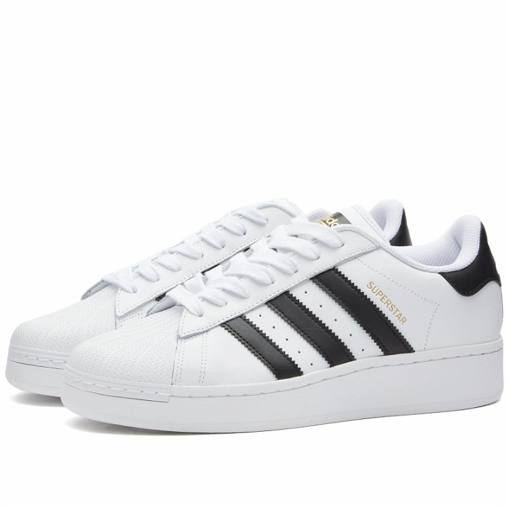 Photo: Adidas Superstar XLG Sneakers in White/Black/Gold