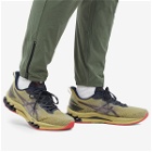 Asics Men's Kinsei Blast LE 2 Sneakers in Olive Oil/Electric Red