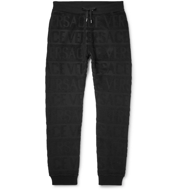 Photo: Versace - Slim-Fit Tapered Logo-Jacquard Cotton-Terry Sweatpants - Men - Black