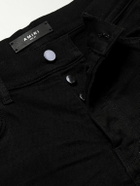 AMIRI - Skinny-Fit Logo-Appliquéd Panelled Distressed Jeans - Black