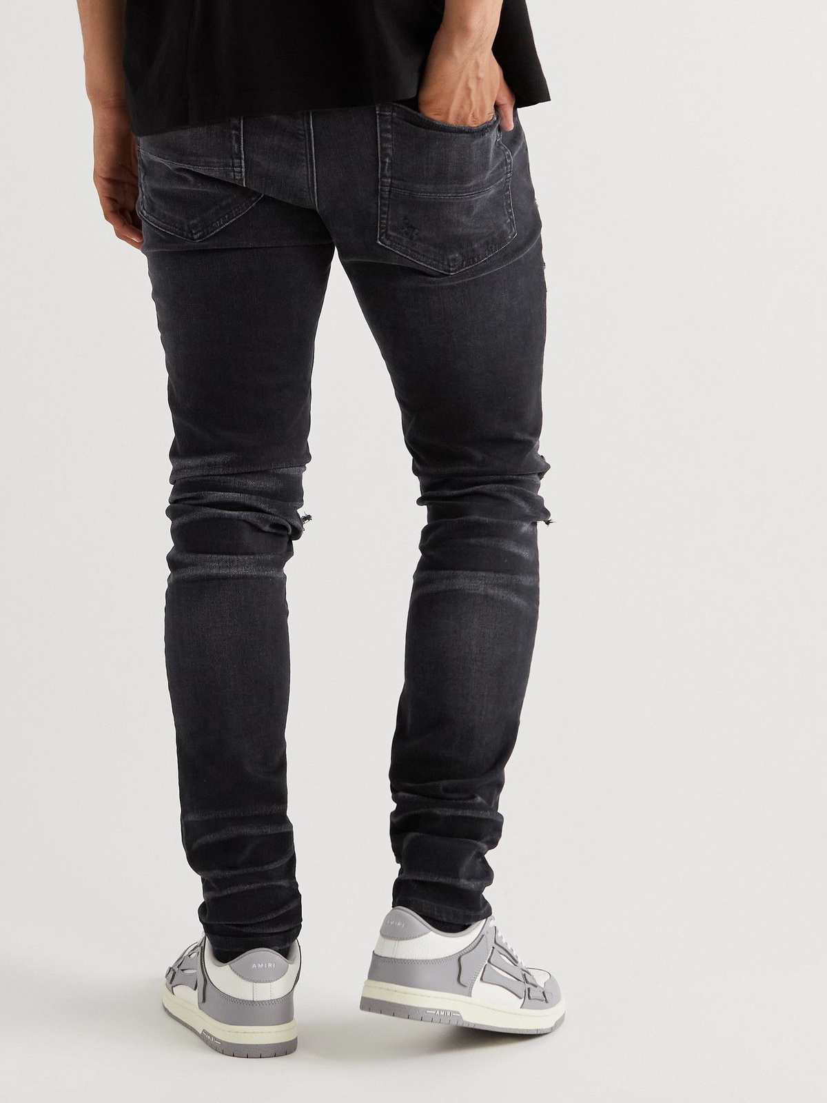 AMIRI - Skinny-Fit Logo-Appliquéd Distressed Jeans - Black Amiri