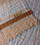 The House of Lyria Xoroi striped jute and wool-blend throw