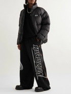 VETEMENTS - Wide-Leg Logo-Print Cotton-Jersey Sweatpants - Black