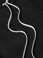 AMIRI - Tapered Logo-Print Cotton-Jersey Sweatpants - Black