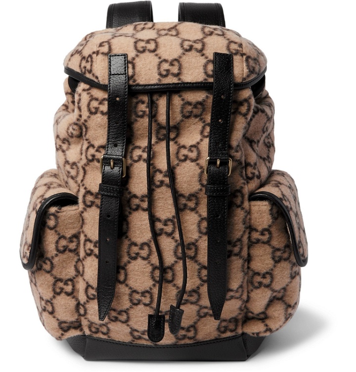 Photo: Gucci - Leather-Trimmed Monogrammed Shearling Backpack - Brown
