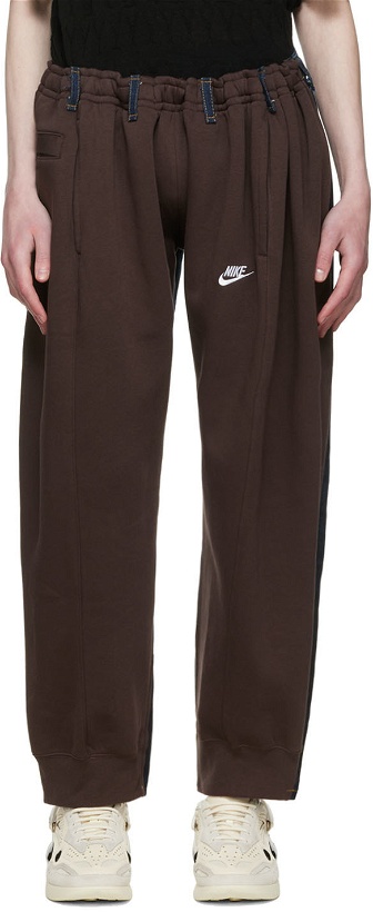 Photo: Bless SSENSE Exclusive Brown Levi's & Nike Edition Lounge Pants
