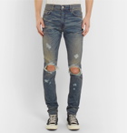 AMIRI - Thrasher Skinny-Fit Distressed Stretch-Denim Jeans - Men - Light blue