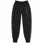 Mastermind Japan Men's Skull Tape Track Pants in Black