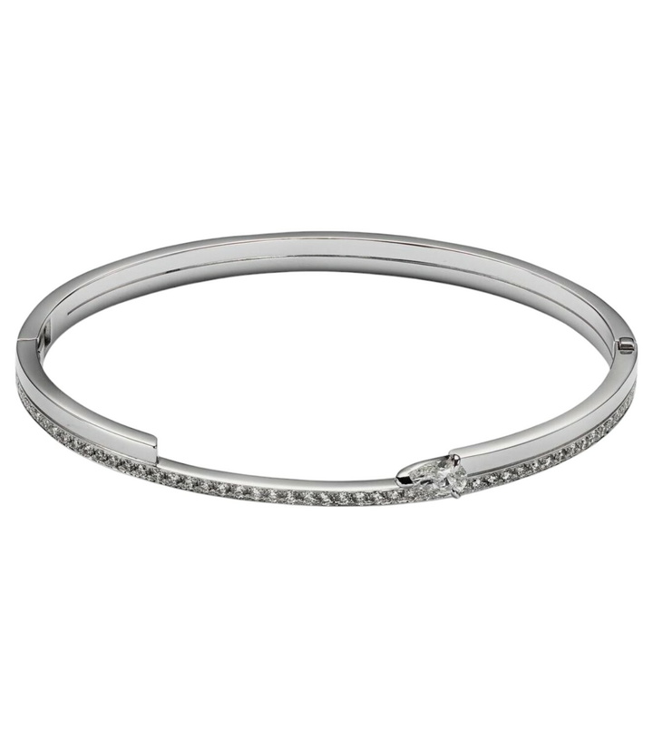 Photo: Repossi Serti Sur Vide 18kt white gold bangle with diamonds