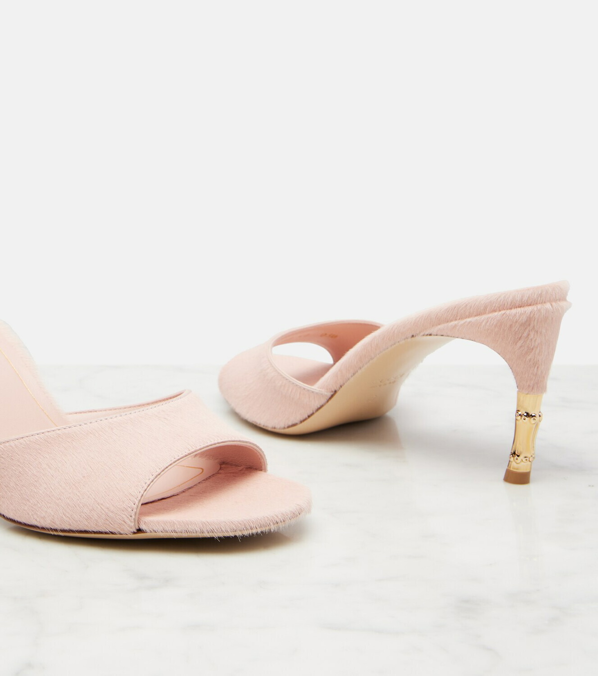 Gucci Castello calf hair mules