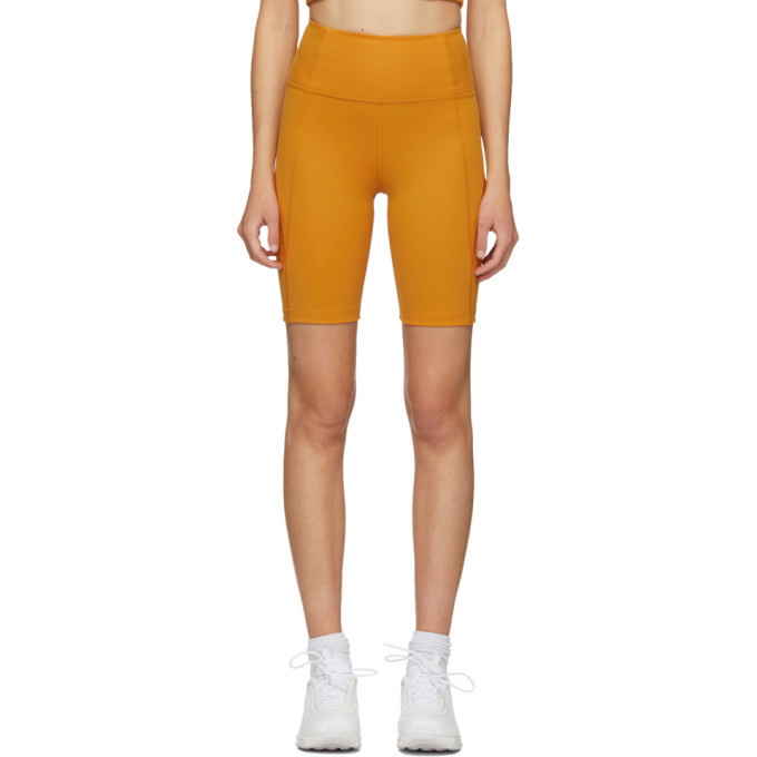 Photo: Girlfriend Collective Yellow High-Rise Biker Shorts