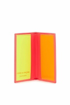 COMME DES GARCONS WALLET portafoglio compatto unisex rosa fluo in pelle di capra Pink
