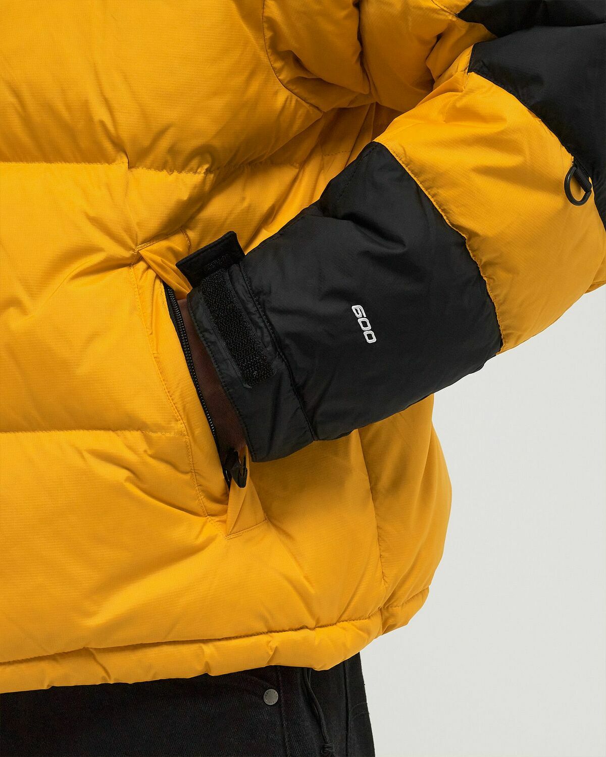 The North Face HMLYN BALTORO JACKET yellow Mens Down & Puffer 