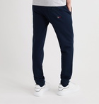 Moncler - Tapered Logo-Print Loopback Cotton-Jersey Sweatpants - Blue