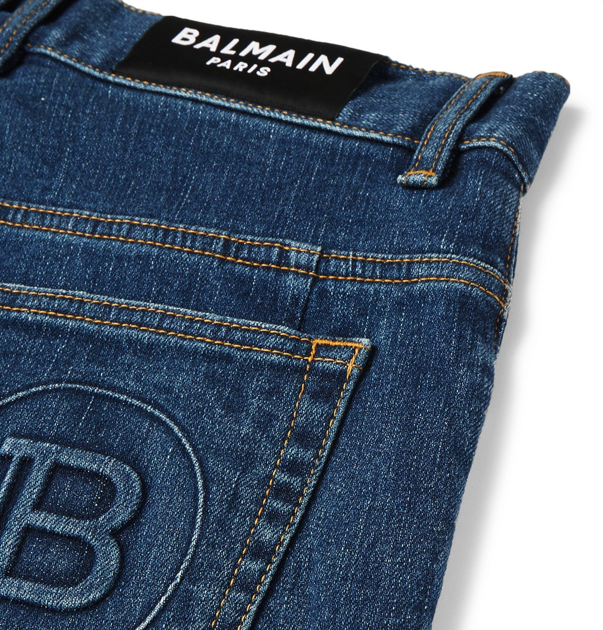 logo embossed monogram slim-fit jeans, Balmain