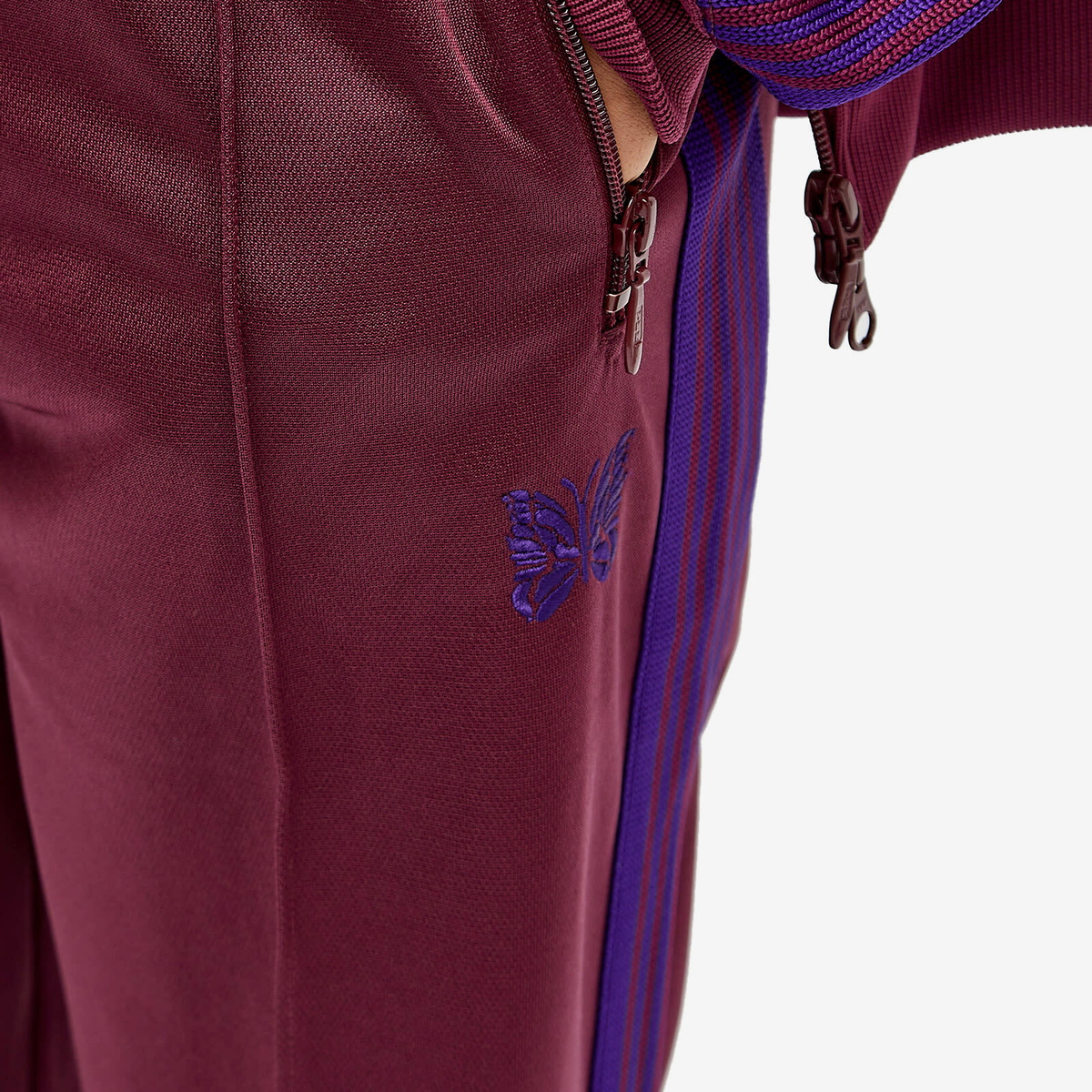Needles Women's Poly Smooth Track Pant in Wine
