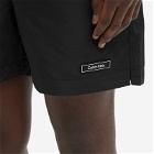 Calvin Klein Men's Patch Logo Swim Short in PVH Black